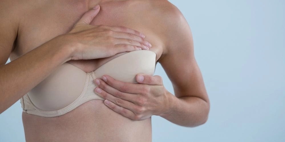 Почему болит грудь во время климакса 17
